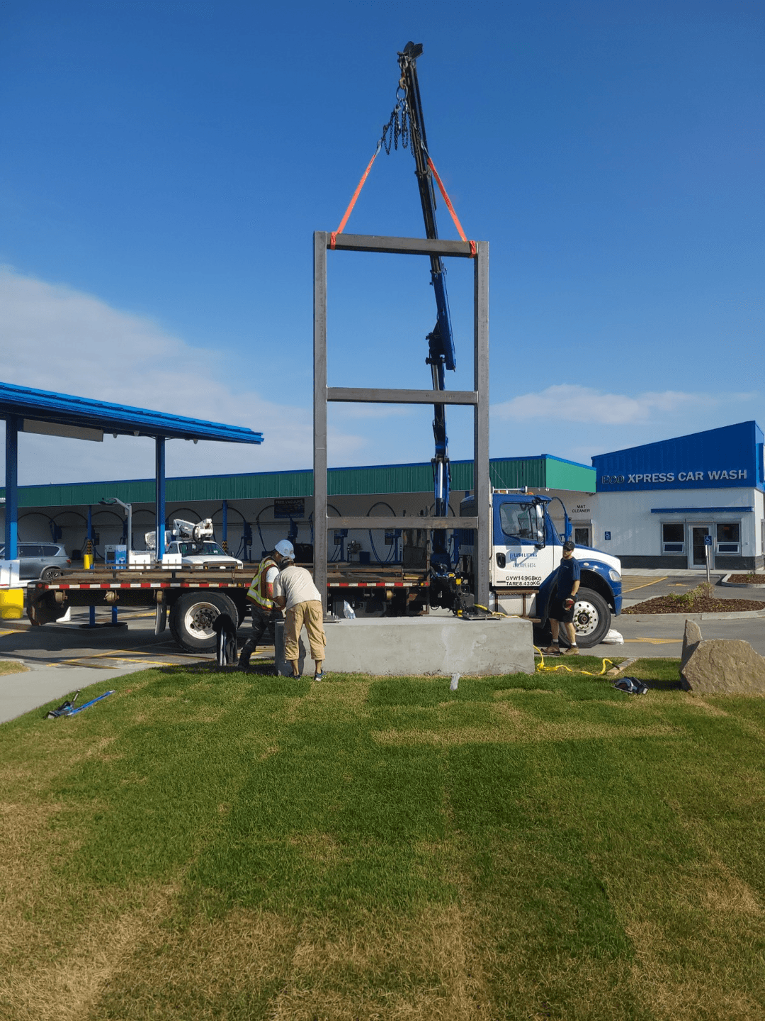 Crane installation of a freestanding sign structure